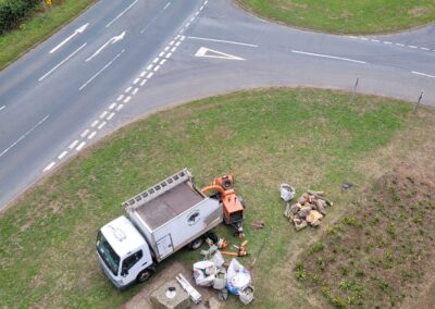 Roadside maintenance with machinery and workers. Lorry parked beside a rural road. Tree surgeon Arbor Works Middlesbrough